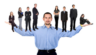 Corporate guy with other people on his shoulders... that's a dev, not a manager.